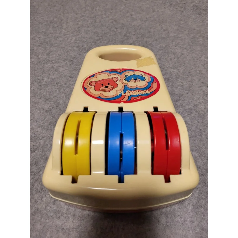 Retro Playskool Toy with Rotating Wheels